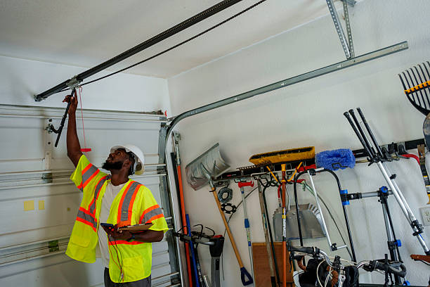 Professional Garage Door Maintenance technician working in Carson City, MI